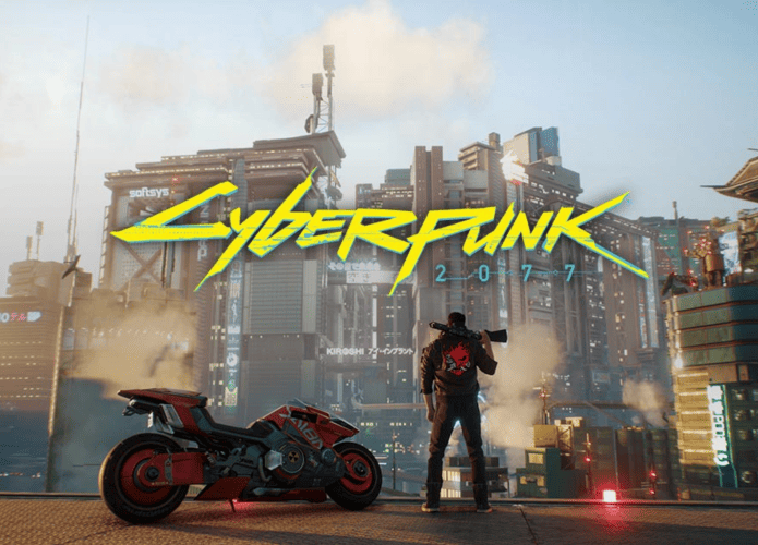 Pôster do jogo Cyberpunk 2077, que mostra uma pessoa em pé quase desfocada e a cidade do game no fundo