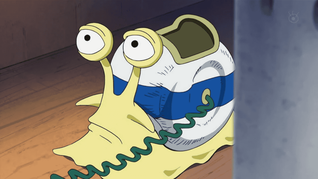 imagem mostra uma cena do anime one piece: um caracol transponder é utilizada como um telefone