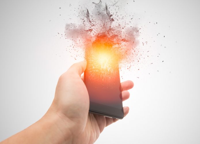 Ilustração de um celular queimando e prestes a explodir