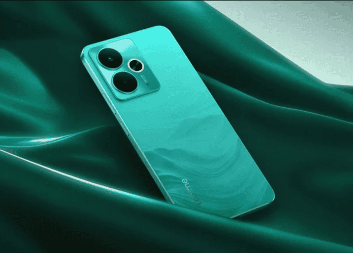 imagem mostra um celular verde sobre as ondas tridimensionais de um tecido verde