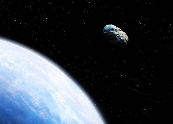 Representação artística de um asteroide passando perto da Terra