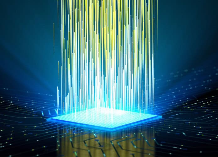 Ilustração de chip emitindo raios de luz para cima em sistema de computador quântico