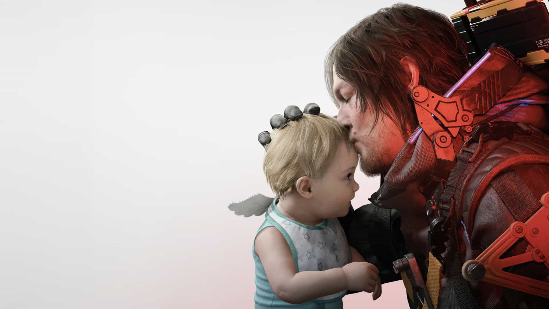 homem beijando um bebe na testa