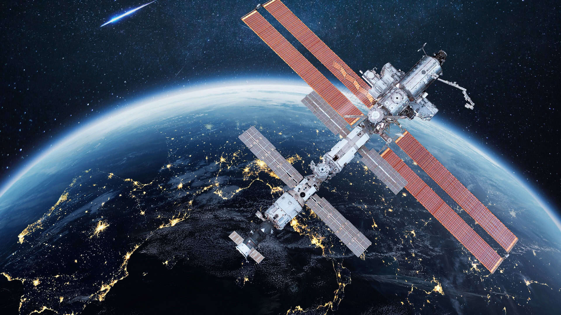 ISS vista do Espaço, com a Terra ao fundo