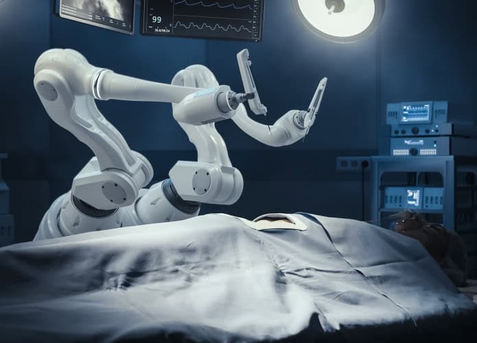 Representação de mãos de robô realizando uma cirurgia
