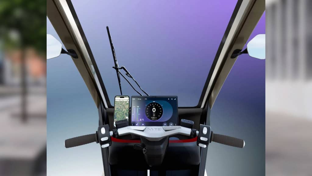 Montagem mostrando parte de dentro da cabine do triciclo elétrico XYTE One