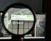 Lupa destacando o canto superior esquerdo do site da OpenAI
