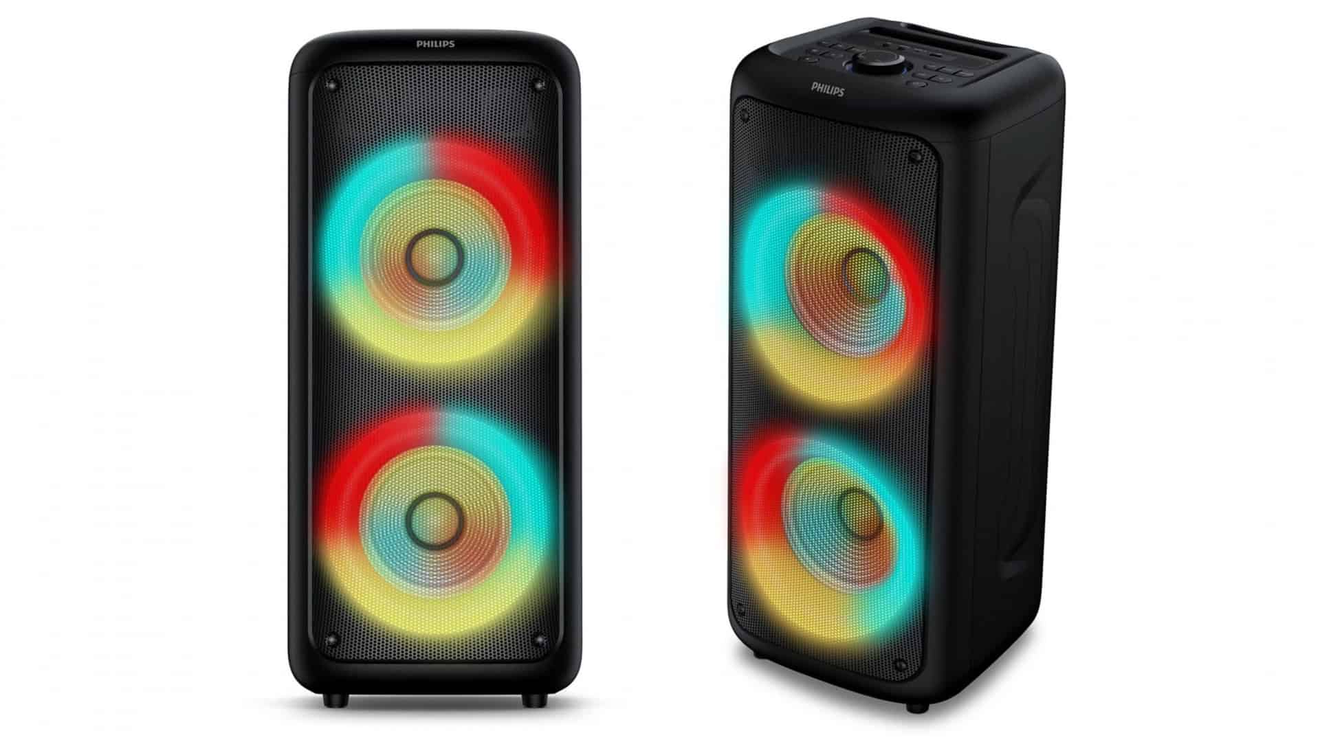 Caixa de som Philips Party Speaker TAX4000 de frente com luzes coloridas acesas nos alto-falantes