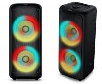Caixa de som Philips Party Speaker TAX4000 de frente com luzes coloridas acesas nos alto-falantes