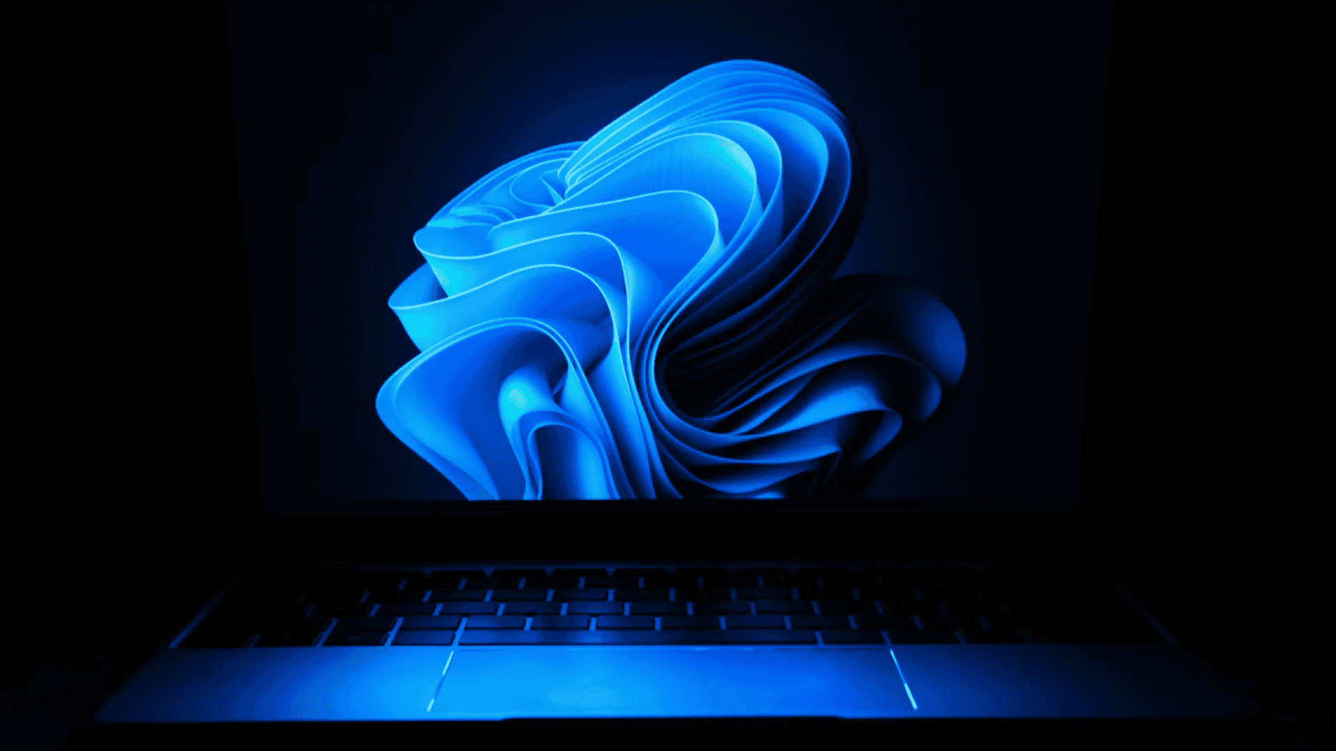 Notebook com fundo de tela do Windows 11