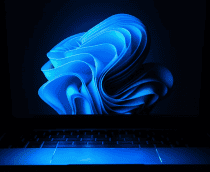 Notebook com fundo de tela do Windows 11