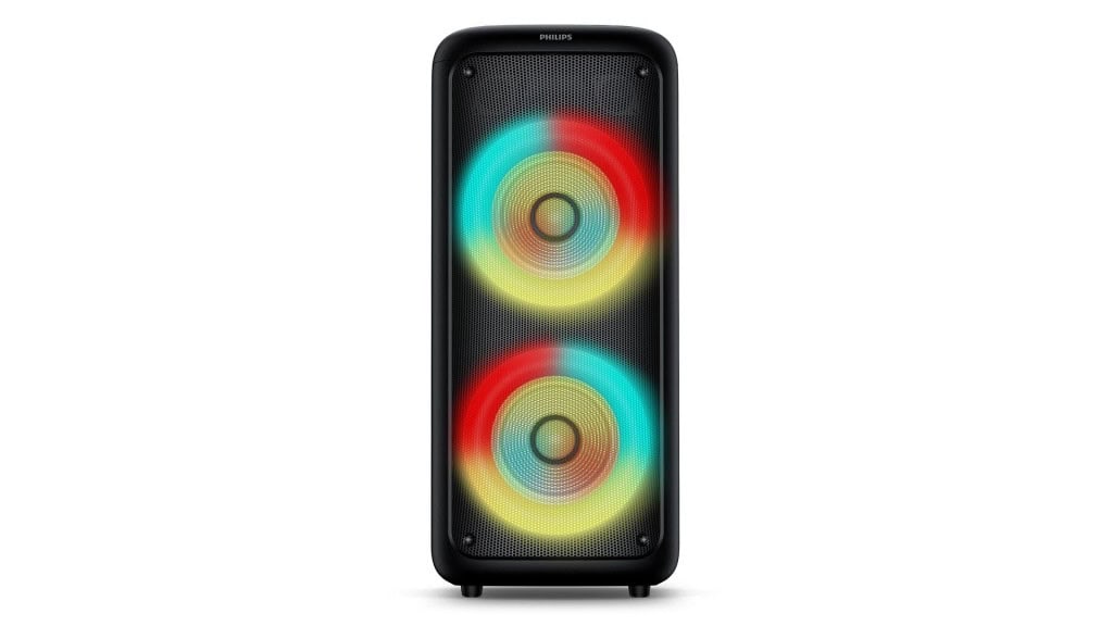 Caixa de som Philips Party Speaker TAX4000 de frente com luzes coloridas acesas nos alto-falantes
