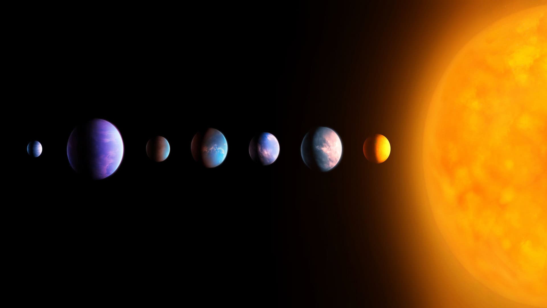 Imagem mostra ilustração de sistema extrasolar com uma estrela e exoplanetas. Planetas de diferentes tamanhos e cores. Panorama espacial