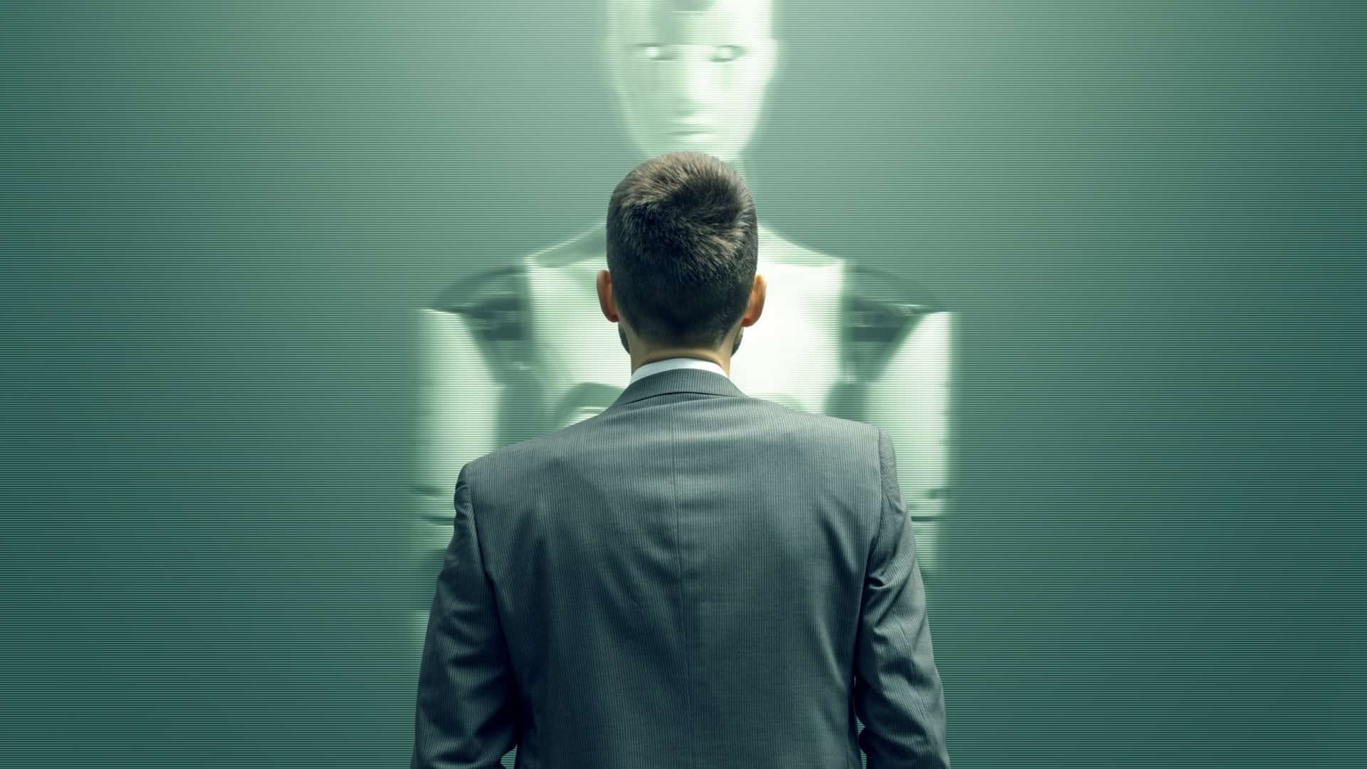 Homem de costas olhando para um robô