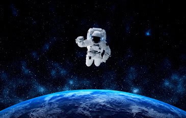 astronauta flutuando acima do planeta terra