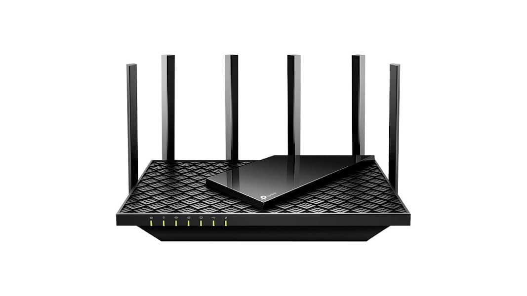 Wi-Fi forte na casa toda: TP-Link Archer AX72 em oferta Quem quer que o Wi-Fi pegue bem em todos os cantos da casa precisa de um roteador potente, capaz de segurar muitos aparelhos conectados sem perder o fôlego. Os modelos com Wi-Fi 6 já são o novo padrão, trazendo mais velocidade, estabilidade e alcance — tudo o que falta quando o sinal começa a sumir nos cômodos mais distantes. Wi-Fi forte na casa toda: TP-Link Archer AX72 em oferta