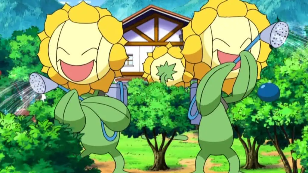 Três Pokémons Sunflora regando plantas em frente a uma casa