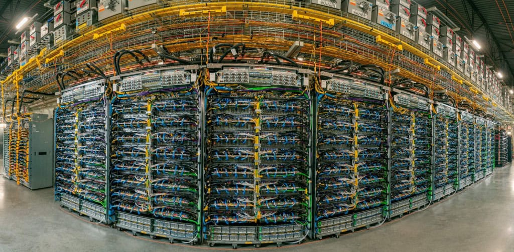 Estrutura de TPUs no data center do Google Cloud: centenas de chips interligados formam um único sistema para treinar modelos gigantes de IA