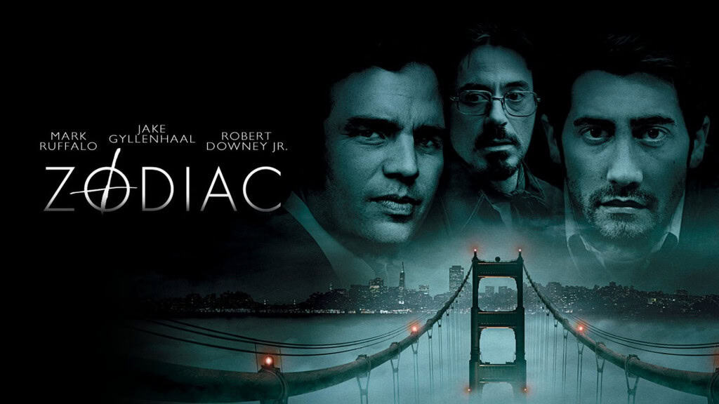 Pôster oficial de Zodíaco (2007), dirigido por David Fincher e estrelado por Jake Gyllenhaal, Mark Ruffalo e Robert Downey Jr.