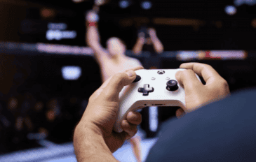 homem jogando jogo na TV usando um controle de Xbox