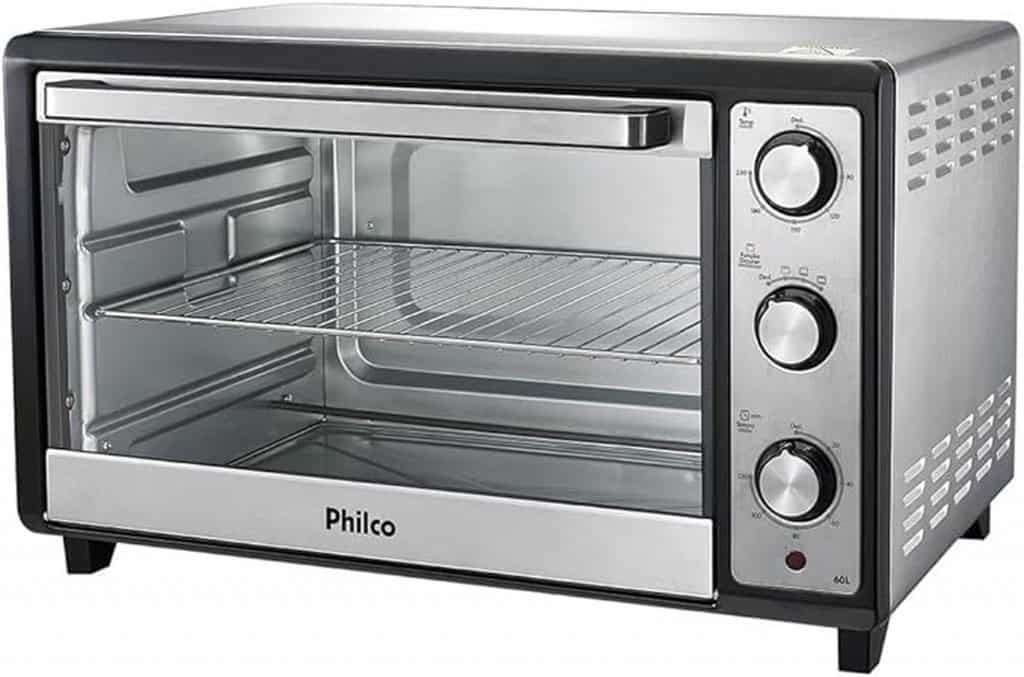 Forno elétrico de bancada Philco PFE60I em aço inox, com porta de vidro transparente, três botões seletores frontais e puxador metálico horizontal.