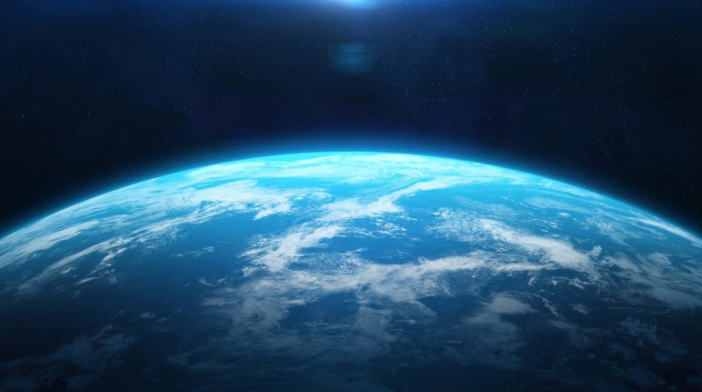 Imagem de uma parta do planeta Terra em meio ao espaço sideral