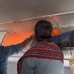 Passageiros tentam conter incêndio no bagageiro de avião após carregador portátil pegar fogo durante voo na Índia